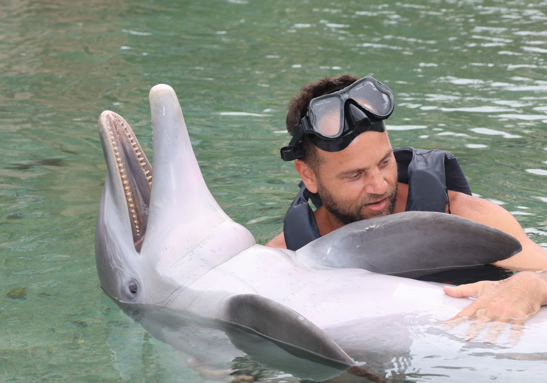 Jason with a dolphin