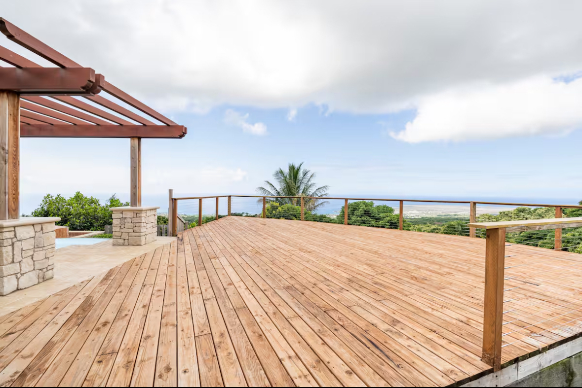 Large wood deck beside the retreat center looking toward the sea